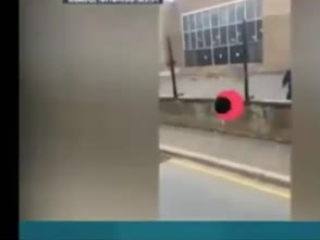 Old bloke walks by nonchalant