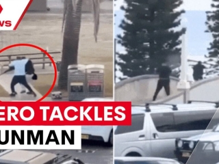 Incredible footage shows hero tackling gunman at Bondi beach shooting