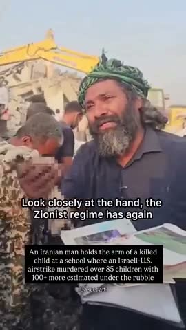 Fake hand, man laughs in background at fake Iranian school bombing