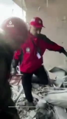 Staged rescue of empty body bag from Iranian movie set