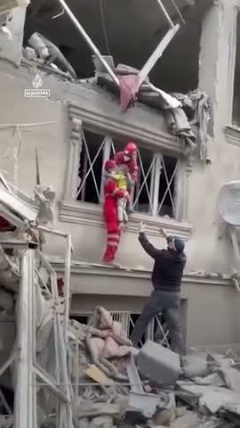 Uninjured people emerge from controlled demolition