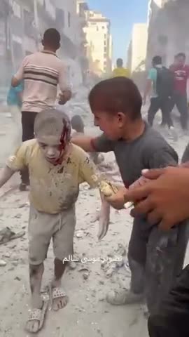 Fake blood, child acting in Gaza