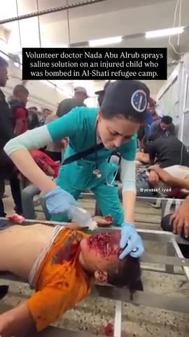 Fake doctor sprays saline onto fake blood