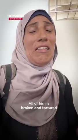 Mom inspects her son's tortured corpse without shedding a single tear